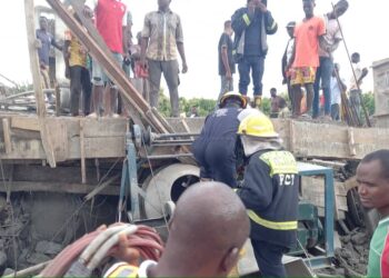 PHOTOS: Four-storey Building Collapses In Abuja, Many Trapped