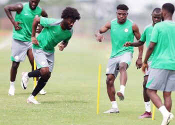 Super Eagles players training on field