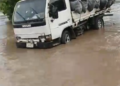 Flooding Submerges Collapsed Bridge in Kwara State, Leaves Commuters Stranded Amid Rising Safety Concerns