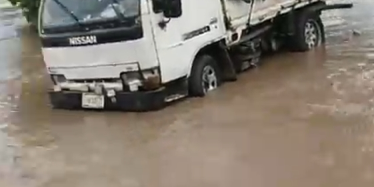 Flooding Submerges Collapsed Bridge in Kwara State, Leaves Commuters Stranded Amid Rising Safety Concerns